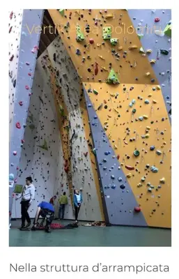 a group of people on a indoor climbing wall at Chalet-Tabià al Sol montagna Dolomiti Pecol in San Tomaso