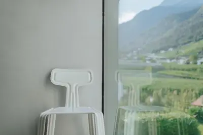 a window with a view of a mountain at chez mone&harry in Lagundo