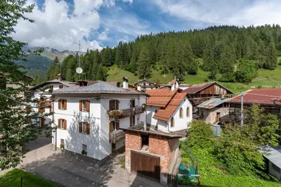 an aerial view of a house in a village at Appartamento Sant Antonio in Canale dʼAgordo