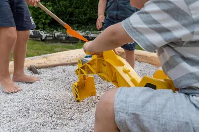 a group of children playing with a toy gun at Dolomitihouse NOGHERA in Fiera di Primiero