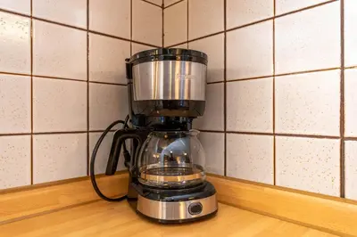 a black blender sitting on top of a counter at Abetaia sul Lago in Alleghe