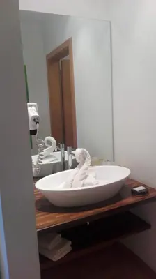 a bathroom sink with a white towel on it at Panorama Residence Schlossblick - Apartments Erdgeschoss in Rodengo